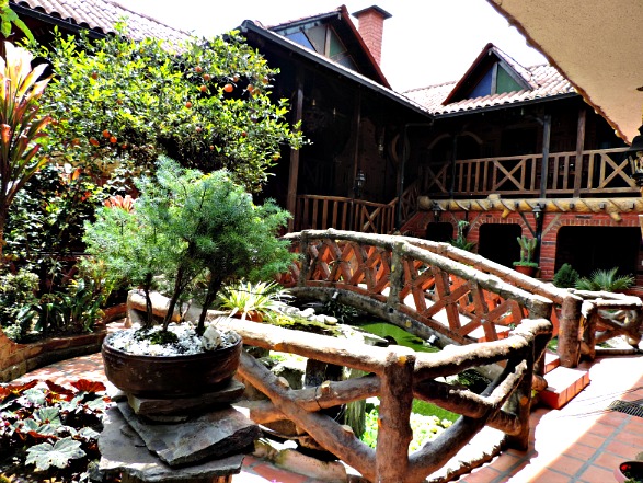 Garden courtyard and fish pond at Jardines de Chamana