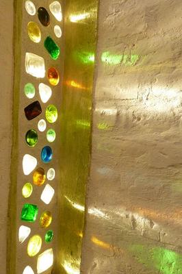 recycled glass bottle windows in stariwell