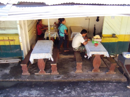 Small eateries outside the Tena bus terminal