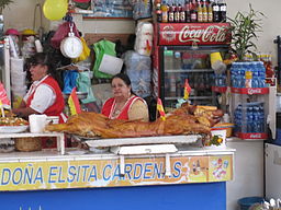 By calliopejen (Cuenca market - hornado  Uploaded by mangostar) [CC-BY-SA-2.0 (http://creativecommons.org/licenses/by-sa/2.0)], via Wikimedia Commons